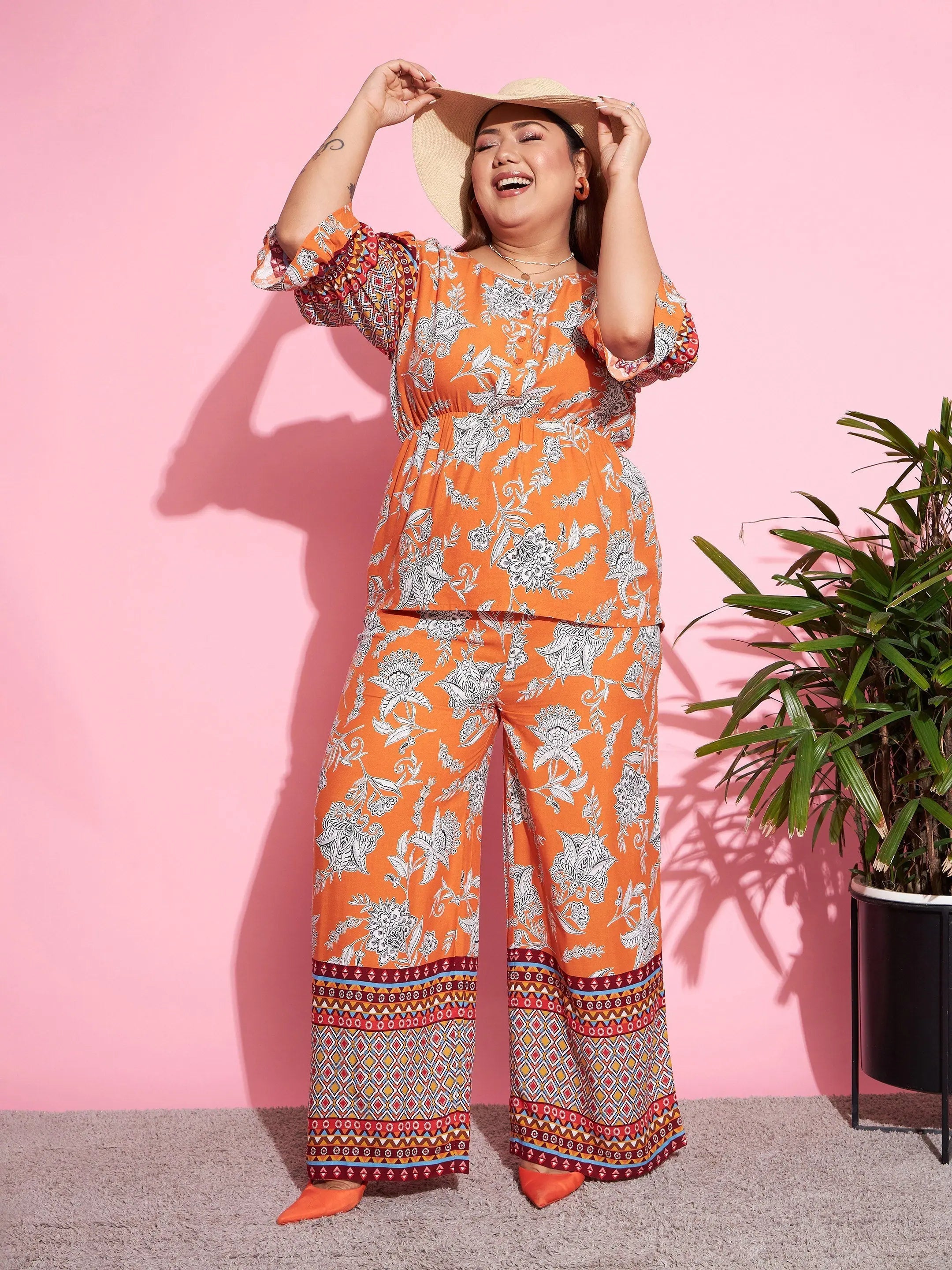 Women Printed Standard Orange Jumpsuits & Sets